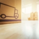 close up image of a moving box with other types of moving boxes in the background